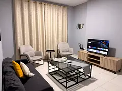 A room and living room with a practical design and a direct sea view.