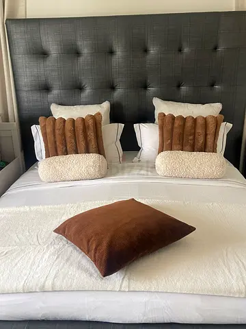 King bed with tufted headboard and mattress included
