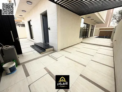 Own your luxury villa in Ajman, two floors and a roof, including electricity, water and air conditioning, with a swimming pool, modern designs and spa