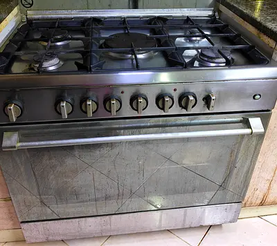 Used 5-Burner Stainless Steel Gas Oven/Stove - Needs Cleaning