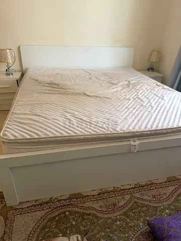 Bed with side tables