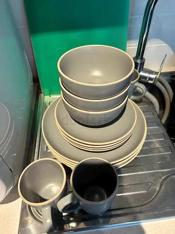 Grey stoneware dinner set — plates, bowls and mugs (used)