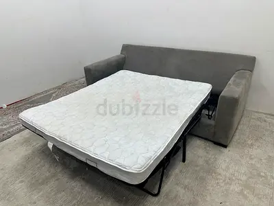 As perfect condition cratebarrel three seater sofa bed
