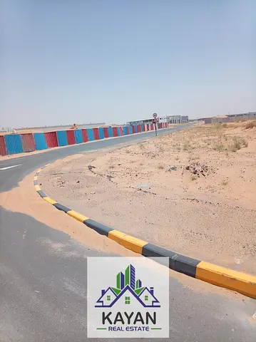 للبيع أرض صناعية زاوية 12,000 قدم² بأم الثعوب ، شارع رئيسي، تصريح أرضي وميزانين و2 طابق.