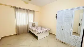 One separate room available for a lady in a 2BHK flat.