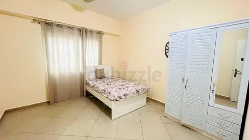 One separate room available for a lady in a 2BHK flat.