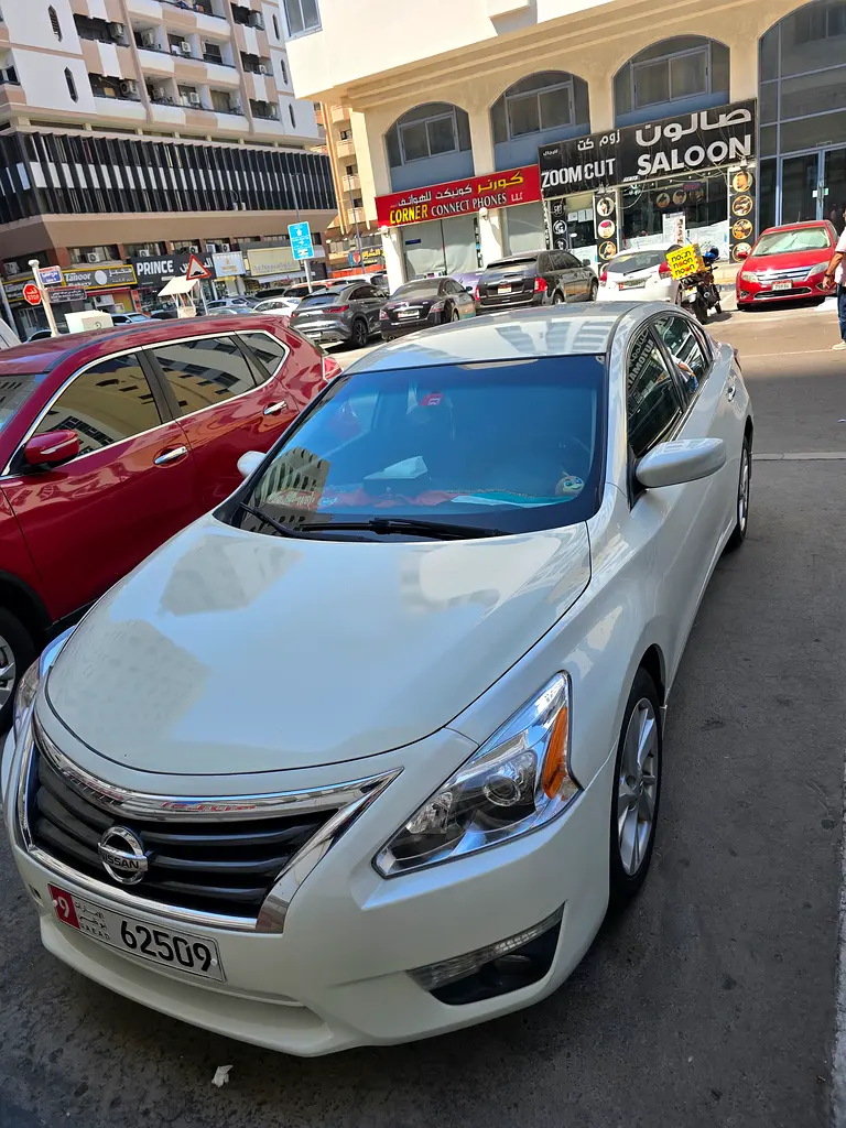 Nissan Altima 2015 — photo 1 of 6