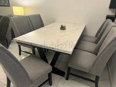 Modern Marble-Top Dining Table with 6 Grey Fabric Chairs