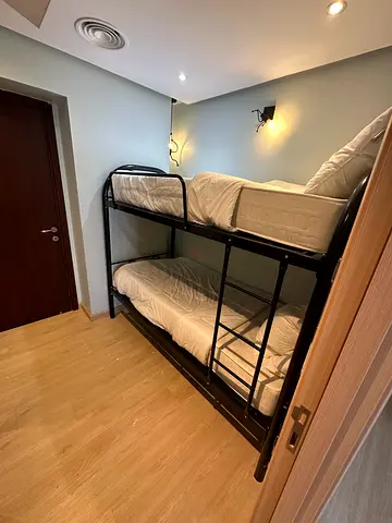 Black Metal Bunk Bed with Mattresses - Good Condition