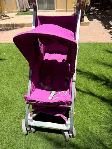 Lightweight pink umbrella stroller, good condition