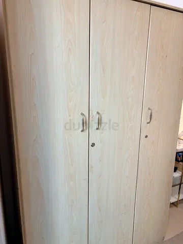 Light wood 3-door wardrobe with locks