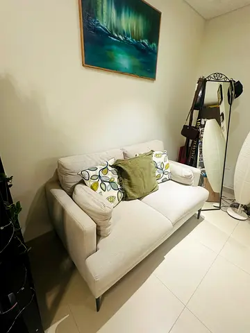Beige 2-seater sofa in good condition