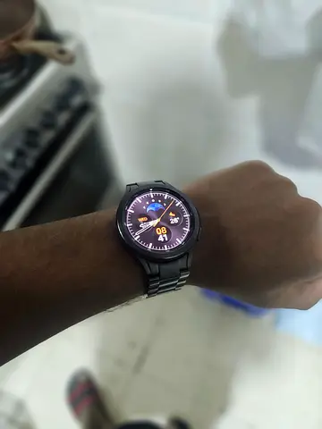 Used black Samsung galaxy Watch 4 classic 46mm round smartwatch with metal strap, silicon strap