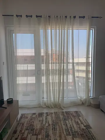 Curtains with matching curtain rods for sale.