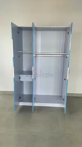 Three-door wardrobe with hanging rail and shelves - good condition