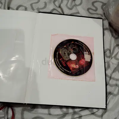 Educational Hardcover Book with Supplementary CD - Good Condition