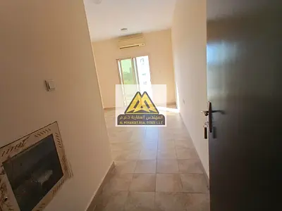 A comfortable apartment suitable for individuals or small families, featuring a balcony with an open view and easy access to all major areas in Ajman.