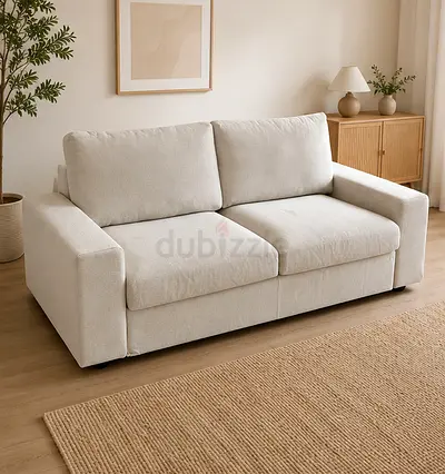 beige 2-seater fabric sofa bed good condition