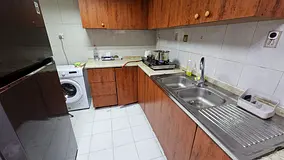 Furnished bedroom with attached washroom