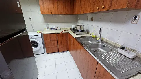 Furnished bedroom with attached washroom