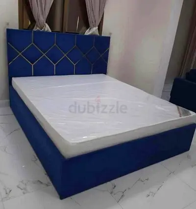 Blue Upholstered King Bed with Padded Headboard
