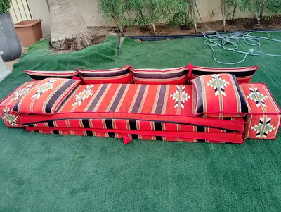 Free red striped floor/couch mattress pad (used) to be collected from Barsha just need wash