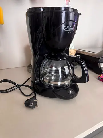 Used Delonghi Black Drip Coffee Maker with Glass Carafe - Good Working Condition