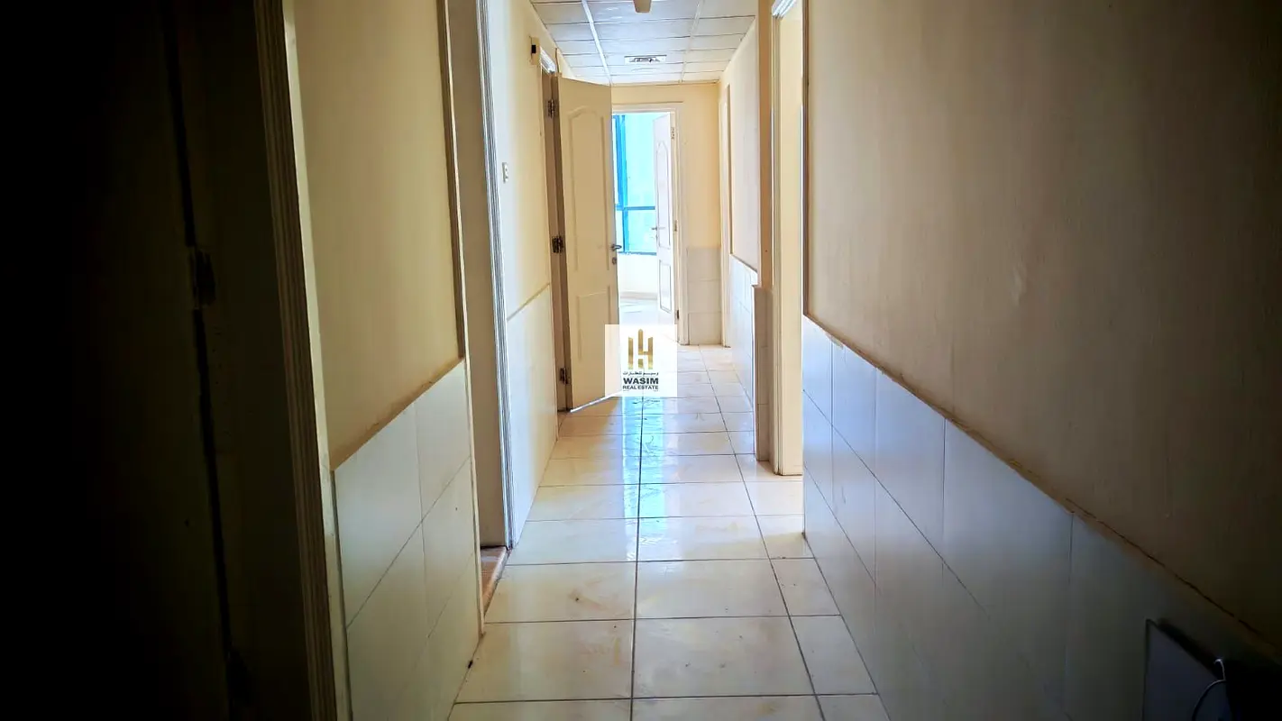 Two bedrooms, a living room, a maid's room with a bathroom, and three bathrooms. Two large bedrooms in Al Khor Towers. Price: 38,000 QAR in four insta