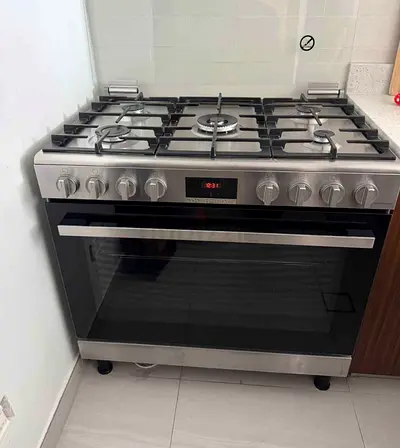 Bosch gas cooker 5 burner , neat and clean perfect, perfect working