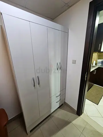 White 4-Door Wardrobe with Drawers 110 x 47 x 205cm — Good Condition