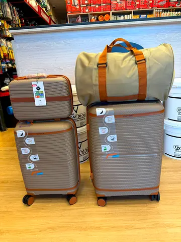 Brand New 3-piece matching luggage set with duffel bag - great condition