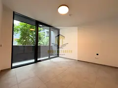 For sale, a one-bedroom apartment in Aljada, 2 balconies and a pool view, vacant and ready for resid