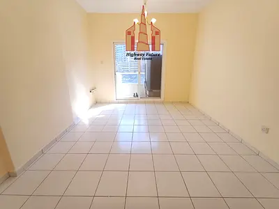 Spacious 2 Bedroom Apartment | 2 Washrooms | Balcony | Family Building | Near Al Nahda Park & Sahar