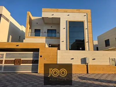 Villa for rent in Al Yasmin, Ajman, consisting of 5 bedrooms, a majlis, a living room, a spacious k