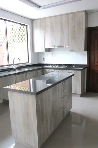Light wood kitchen cabinets and island - good condition