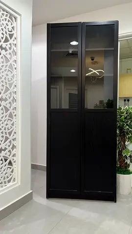 IKEA Tall Black Storage Cabinet with Multiple Shelves - Good Condition