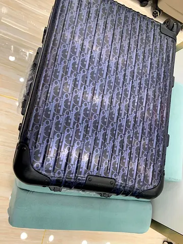 Dior and Rimowa aluminum cabin suitcase