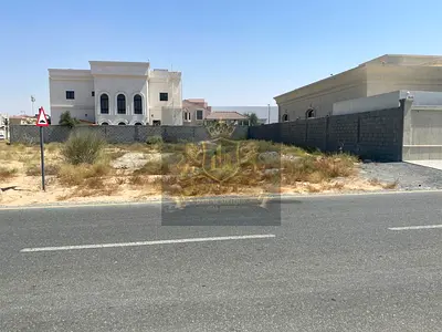 For sale in Sharjah Al Hoshi area Residential plot of land with an area of ​​10,000 feet Very distinguished location on a neighboring street Close to
