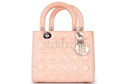 Authentic Christian Dior Lady Dior handbag in blush pink patent leather.