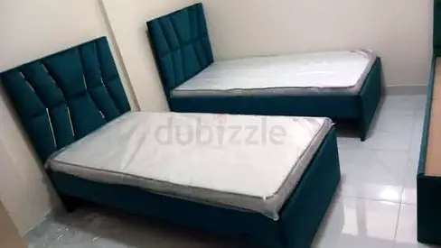 Two Single Upholstered Beds with Headboards - Teal