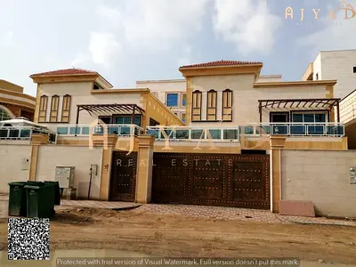 For sale: two-story villa in Al Mowaihat 3 Ajman, 6 master bedrooms, majlis living room kitchen, terrace, land 5400 sq ft, built 5000 sq ft, on paved