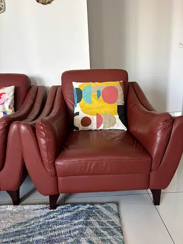 Maroon Leather Sofa — Comfortable Single and Two Seater, Good Condition.