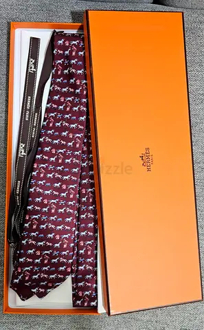 Red Hermès Silk Tie with Geometric Pattern