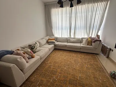 Classifieds: west elm L shape sofa feather | dubizzle Abu Dhabi
