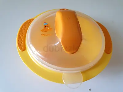 Baby feeding yellow food container