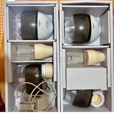 Set of electric breast pump parts and baby bottles - gently used