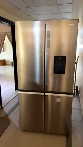 Haier 4 door side by side refrigerator with water dispenser latest
