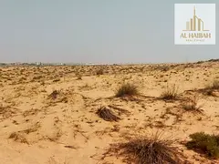 Residential land for sale in Al Tayy, east of Al Suyoh suburb, Sharjah.