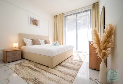 Elegant Beachside 1 BR | Dedicated Workspace | Pool & Gym