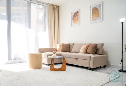 Elegant Beachside 1 BR | Dedicated Workspace | Pool & Gym